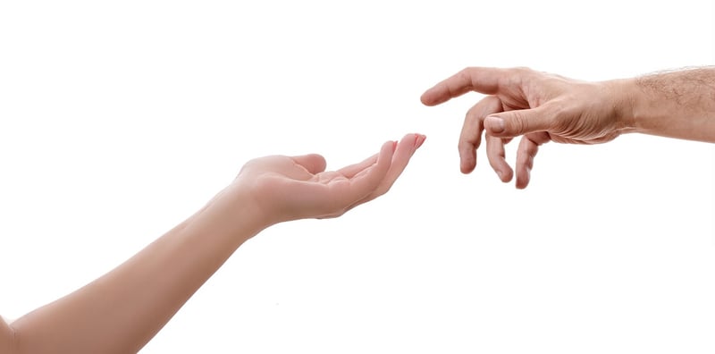 Hands holding lightbulb